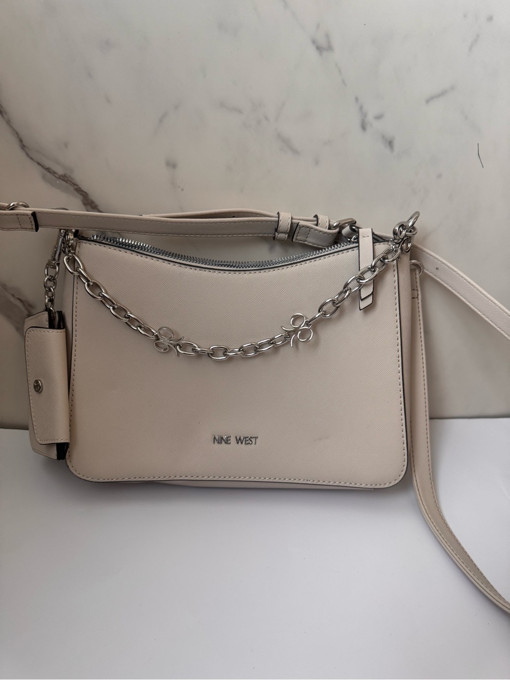 Nine West Cream Crossbody Bag – Chain Detail, Adjustable Strap, Silver Hardware